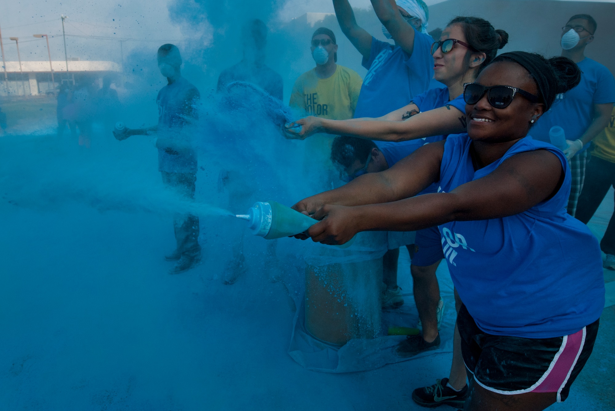 Airmen from Sheppard Air Force Base, Texas, get colorful with citizens of Wichita Falls during The Color Run, Sept. 7, 2013. The Color Run teamed with Wichita Falls Habitat for Humanity and donated a portion of the proceeds to the non-profit agency. The blue color zone was called "Air Force Blue" in honor of the men and women who serve at Sheppard.  (U.S. Air Force photo/Staff Sgt. Mike Meares) 