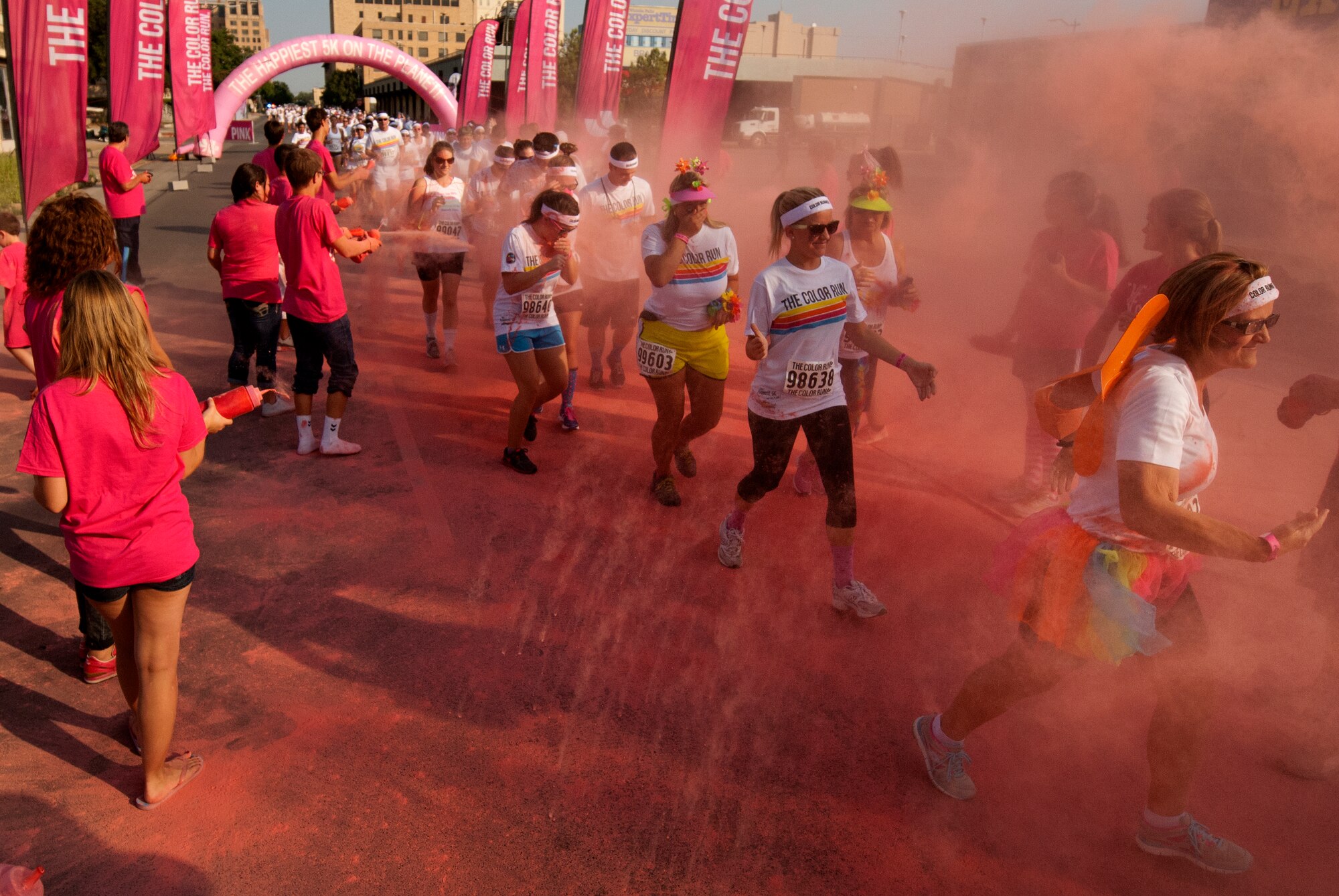 Airmen from Sheppard Air Force Base, Texas, get colorful with citizens of Wichita Falls during The Color Run, Sept. 7, 2013. There were more than 30 volunteers to help participants get colorful during five color zones.  (U.S. Air Force photo/Staff Sgt. Mike Meares) 