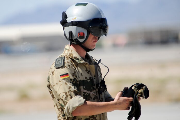 German air force Tech. Sgt. Michael Gleich, 33rd Fighter Bomber Wing crew chief, Buechel Air Base, Germany, prepares to launch a PA 200 Tornado for a training mission during a Green Flag-West exercise Sept. 5, 2013, at Nellis Air Force Base, Nev. The PA 200 Tornado is jointly developed and manufactured by Germany, Italy and the United Kingdom. (U.S. Air Force Photo by Lorenz Crespo)
