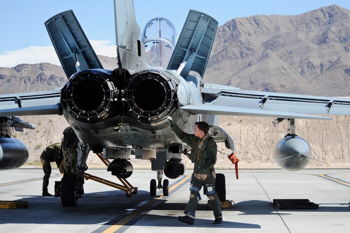 German air force 1st Lt. Felix Wilms, 33rd Fighter Bomber Wing pilot, Buechel Air Base, Germany, conducts a pre-flight safety inspection on a PA 200 Tornado during a Green Flag-West exercise Sept. 5, 2013, at Nellis Air Force Base, Nev.  Pilots train for close air support during the two-week Green Flag exercise. (U.S. Air Force Photo by Lorenz Crespo)