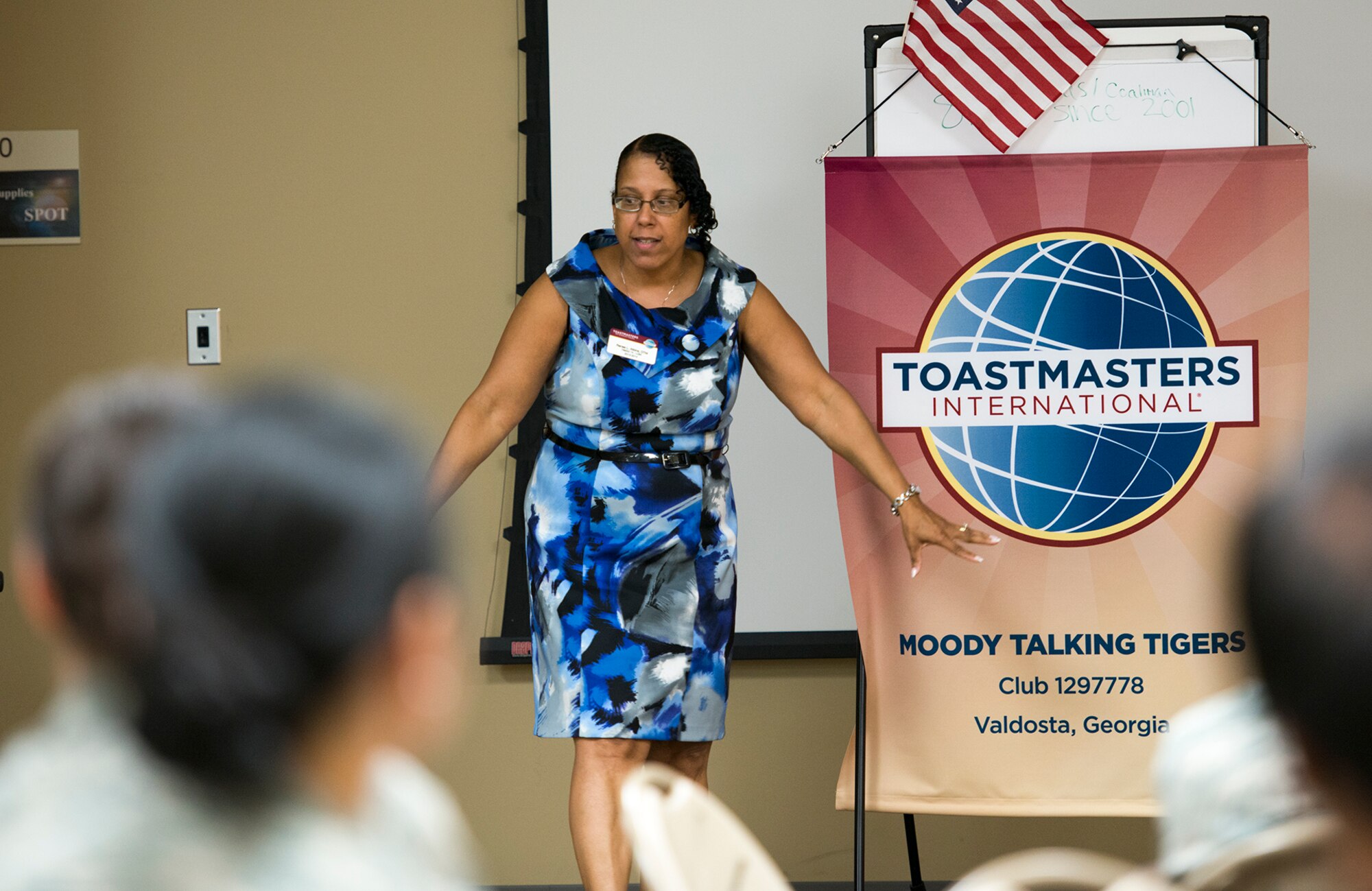 Renee Atkins, Toastmasters District 14 secretary, speaks on self improvement at The SPOT, Moody Air Force Base, Ga., Sept. 8, 2013. Atkins also served as the Table Topics master, whose role is to prepare impromptu topics to help members think on their feet. (U.S. Air Force photo by Airman 1st Class Ryan Callaghan/Released)
