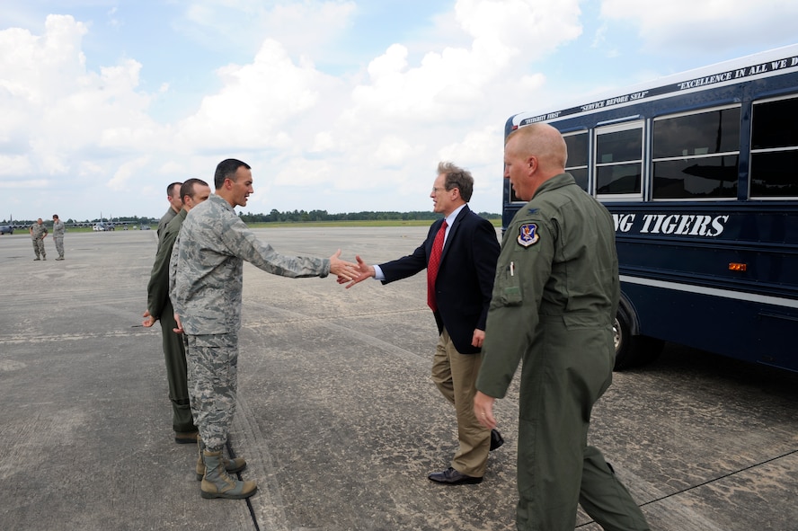 U.S. Air Force Col. Steven Gregg, 347th Rescue Group commander, greets U.S. Rep. Jack Kingston at Moody Air Force Base, Ga., Sept. 6, 2013. During his visit, Kingston toured on the new HC-130J Combat King II for the first time since it arrived at Moody in July. (U.S. Air Force photo by Airman 1st Class Olivia Bumpers/Released)