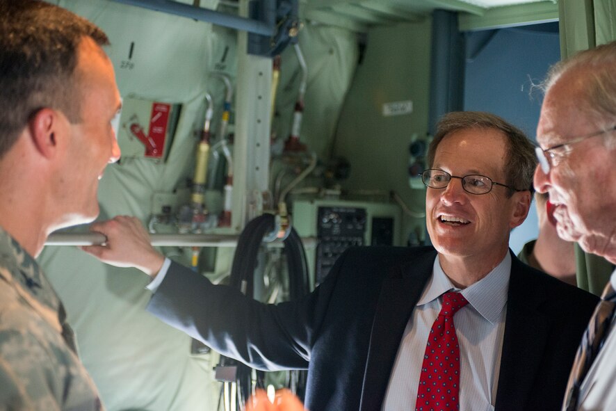 U.S. Air Force Col. Steven Gregg, left, 347th Rescue Group commander, U.S. Rep. Jack Kingston, center, and Parker Greene, Moody Support Committee chairman, speak about the rescue mission at Moody Air Force Base, Ga., Sept. 6, 2013. The group contains four squadrons and more than 600 aircrew personnel. (U.S. Air Force photo by Airman 1st Class Ryan Callaghan/Released)
