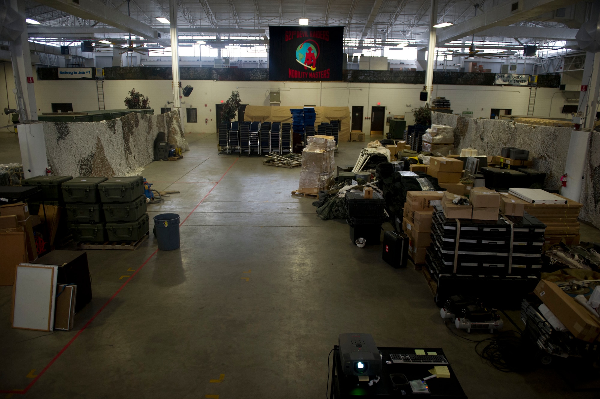 JOINT BASE MCGUIRE-DIX-LAKEHURST, N.J. - Equipment stored in the Global Reach Deployment Center is sorted by volunteer Airmen during a clean out of the GRDC, here, Aug. 7, 2013. (U.S. Air Force photo by Staff Sgt. Gustavo Gonzalez)