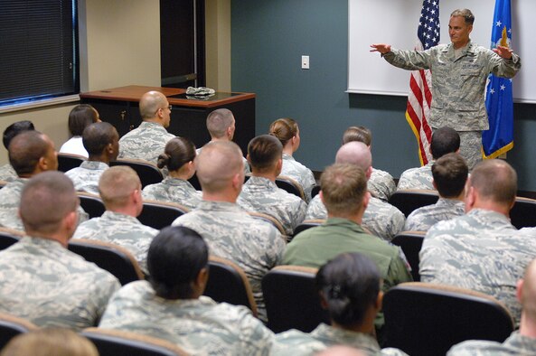 U.S. Air Force Maj. Gen. Jake Polumbo, 9th Air Force commander, briefs Airmen during a mid-level supervisor meeting at Seymour Johnson Air Force Base, N.C., Aug. 23, 2013. Polumbo discussed the roles Airmen play in today’s Air Force, the leadership required and responsibilities that must be accepted in order to achieve success.  (U.S. Air Force photo by Airman 1st Class Brittain Crolley