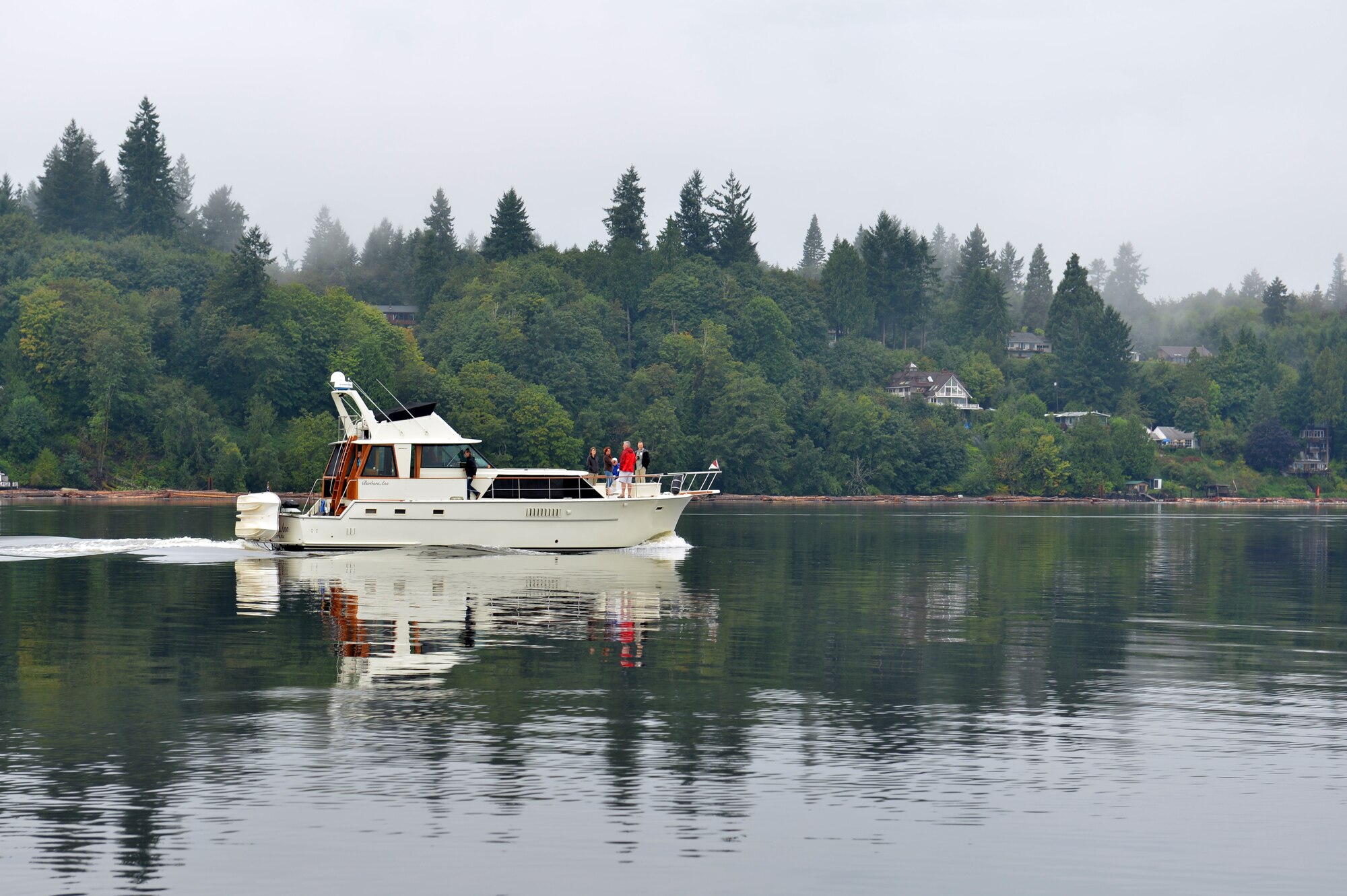 One of the many yachts with service members aboard cruise the Puget Sound, Sept. 6, 2013 at Olympia, Wash. More than 300 service members were invited by the Thurston County Chamber of Commerce in this years event. (U.S. Air Force photo/Staff Sgt. Jason Truskowski)