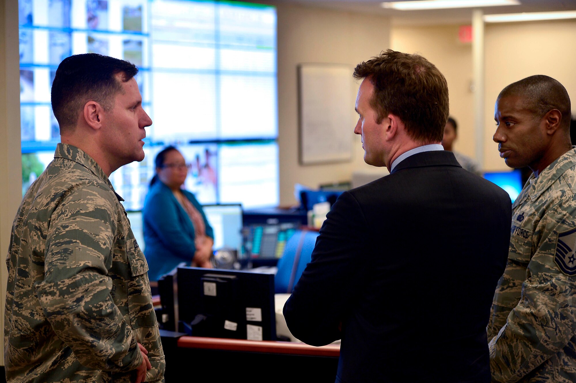 Acting Secretary of the Air Force Eric K. Fanning receives a brief from Col. John Devillier (left), Armed Forces Mortuary Affairs Operations commander, and Master Sgt. Porter L. Gee, AFMAO C3 superintendent, at Dover Air Force Base, Del. Sept. 5, 2013. The Acting SECAF is visiting Air Force bases to speak with Airmen about the Air Force and its future. (U.S. Air Force photo/David S. Tucker)
