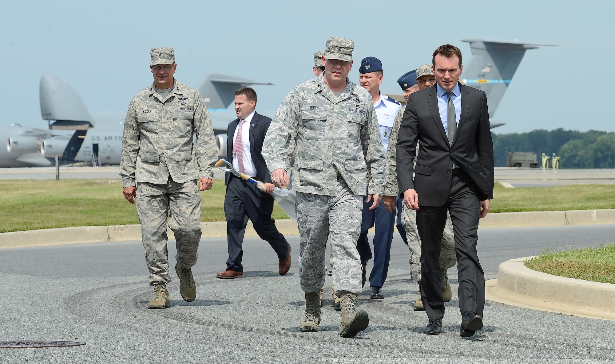 Acting Secretary of the Air Force Eric K. Fanning, (right) walks with Col. Rick Moore, 436th Airlift Wing commander, after Fanning's arrival Sept. 5, 2013, at Dover Air Force Base, Del. Fanning visited the base to better understand the variety of missions performed by the 436th Airlift Wing and Team Dover. Fanning reviewed aircraft, mission systems, simulators and Air Force Mortuary Affairs Operations. (U.S. Air Force photo/Greg L. Davis)