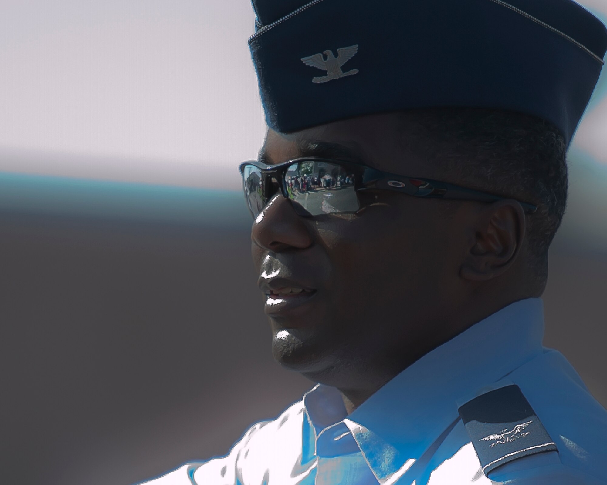 A crowd of Mountain Home, Idaho, residents can we seen glimmering in the sunglass reflection as they watch the 53rd annual Air Force Appreciation Day parade pass by, and children eagerly wait for Col. Michael Lawrence, 366th Maintenance Group commander, to throw candy their way. The parade was followed by a celebration, and free food and beverages in the town park on Sept. 7, 2013. (U.S. Air Force photo by Master Sgt. Kevin Wallace/RELEASED)