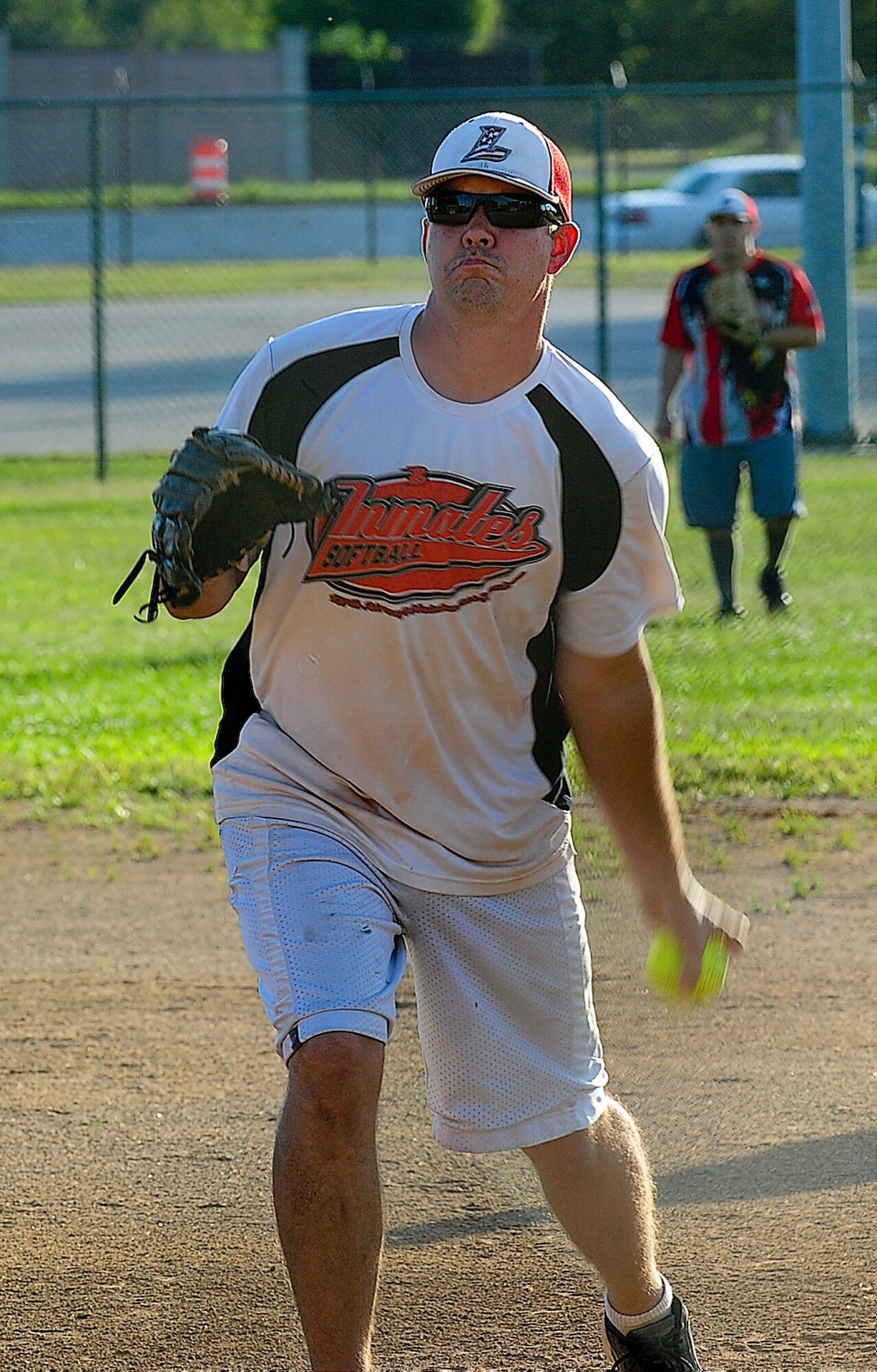 Matthew Morrison, 436th Aircraft Maintenance Squadron pitcher, tosses a pitch during the base softball championship Sept. 4, 2013, at the softball field on Dover Air Force Base, Del. Morrison pitched in both games leading the 436th AMXS to the title against the 373rd Training Squadron/Maintenance Operations Squadron. (U.S. Air Force photo/Airman 1st Class Ashlin Federick)