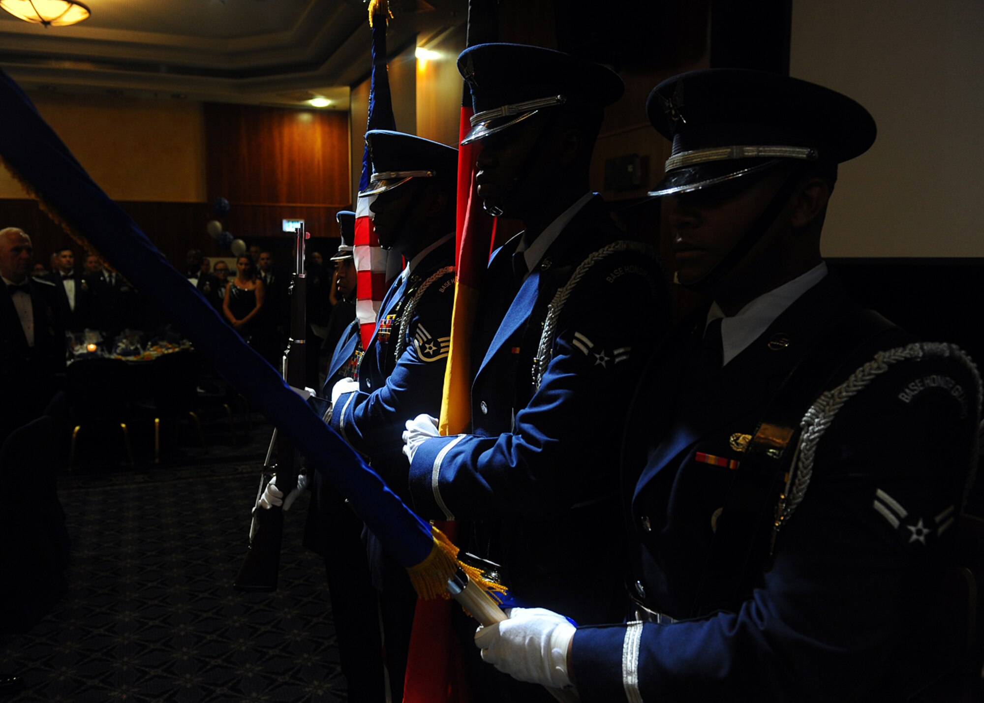 SPANGDAHLEM AIR BASE, Germany – Members of the 52nd Force Support Squadron Honor Guard team post the colors during the singing of the U.S. and German national anthems at the Air Force Ball at Club Eifel Sept. 7, 2013. The theme for the event was “Shining Stars … Remembering the Past … Forging the Future.”  More than 200 Airmen and family members from the Spangdahlem community joined together to celebrate and honor Air Force heritage during the ball. (U.S. Air Force photo by Staff Sgt. Daryl Knee/Released)