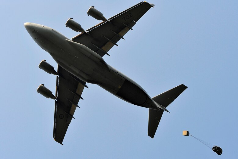 FORT POLK, La. – A Canadian Royal Air Force C-17 Globemaster II passes over the ‘Strike’ Drop Zone at Fort Polk, La., Aug. 17, 2013. The aircraft was conducting a joint airdrop training mission with the Royal New Zealand Air Force and U.S. Air Force Airmen based at Little Rock Air Force Base, Ark. (U.S. Air Force photo by Tech. Sgt. Parker Gyokeres)(Released)
