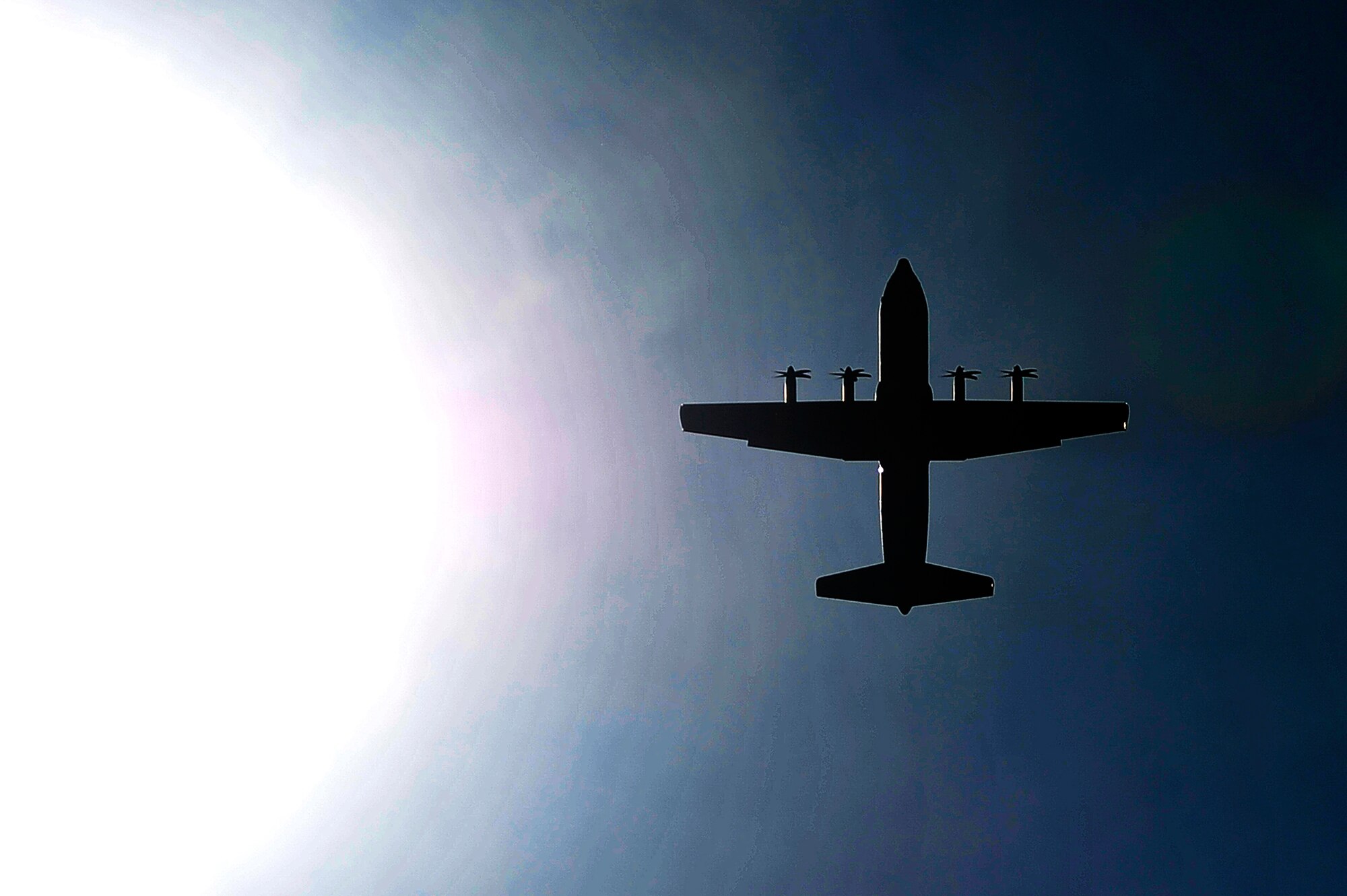 FORT POLK, La. – A Canadian Royal Air Force C-130J Hercules passes over the ‘Strike’ Drop Zone at Fort Polk, La., Aug. 16, 2013. The aircraft was conducting a joint airdrop training mission with the 621st Contingency Response Wing, Royal New Zealand Air Force and U.S. Air Force Airmen based at Little Rock Air Force Base, Ark. (U.S. Air Force photo by Tech. Sgt. Parker Gyokeres)(Released)
