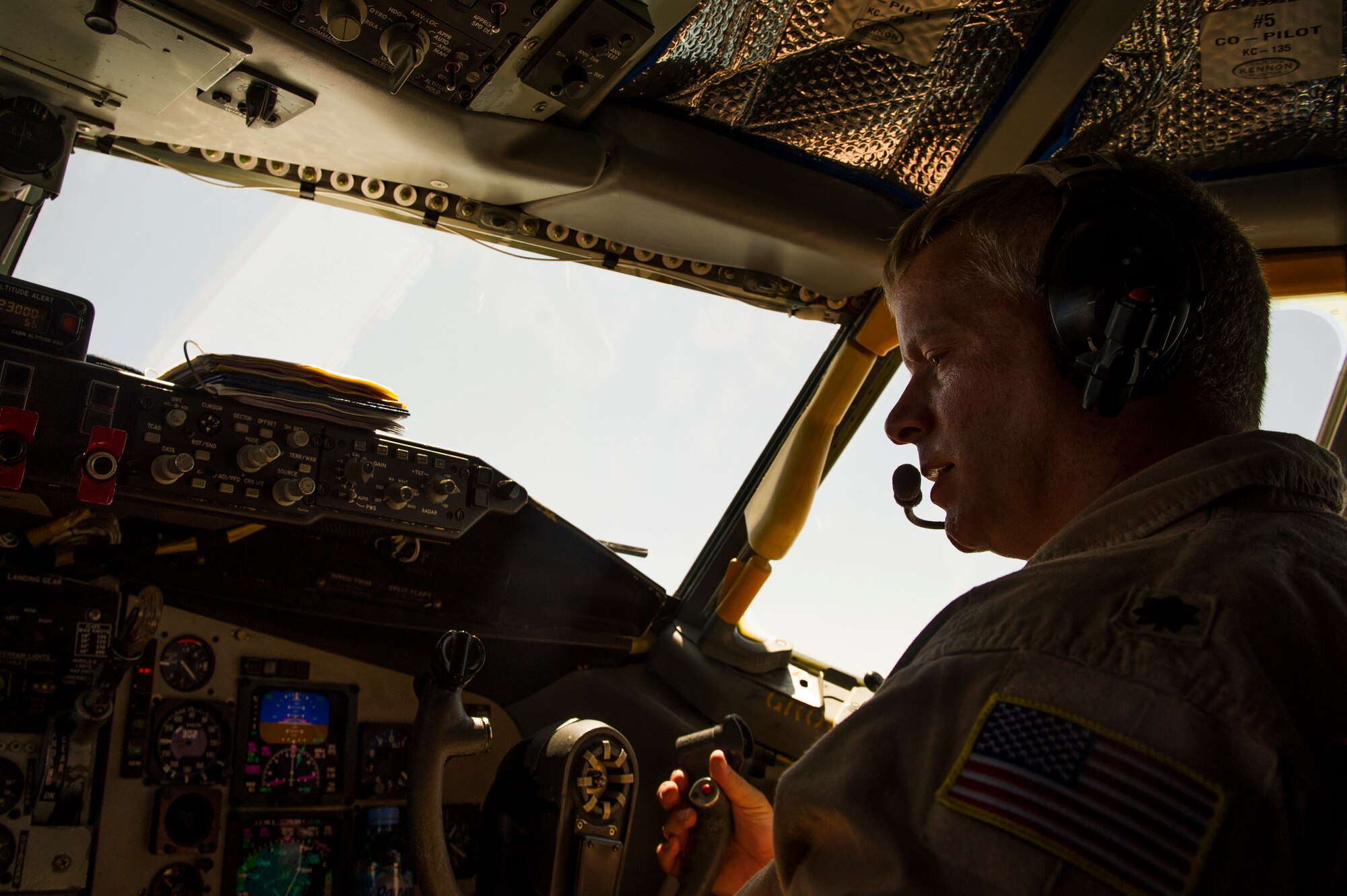 U.S. Air Force Lt Col. Jerry Selig, 340th Expeditionary Air Refueling Squadron KC-135 Stratotanker pilot, checks gauges during an air refueling mission over Afghanistan Sept. 4, 2013. Selig is deployed from the 756th Air Refueling Squadron, at Andrews Air Force Base in support of Operation Enduring Freedom. (U.S. Air Force photo by SSgt Stephany Richards)