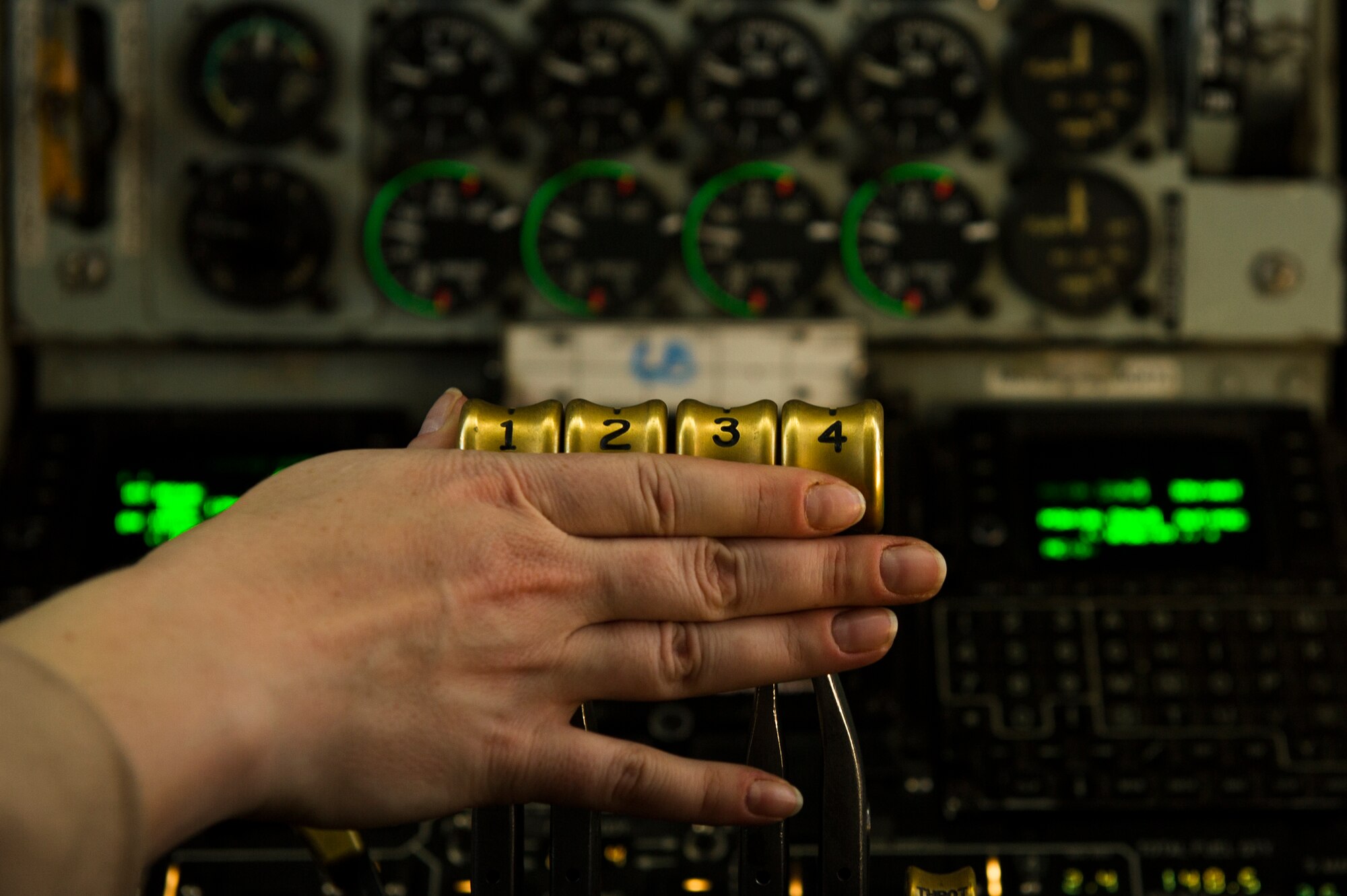 U.S. Air Force Maj. Abby Kent, 340th Expeditionary Air Refueling Squadron KC-135 Stratotanker pilot, adjust the throttle during an air refueling mission over Afghanistan Sept. 4, 2013. Kent is deployed from the 756th Air Refueling Squadron, at Andrews Air Force Base in support of Operation Enduring Freedom. (U.S. Air Force photo by SSgt Stephany Richards)