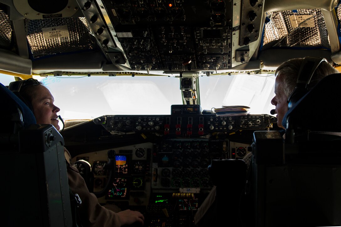 U.S. Air Force Maj. Abby Kent and Lt Col Jerry Selig, 340th Expeditionary Air Refueling Squadron KC-135 Stratotanker pilots, talk during an air refueling mission over Afghanistan Sept. 4, 2013. Kent and Selig are deployed from the 756th Air Refueling Squadron, at Andrews Air Force Base in support of Operation Enduring Freedom. (U.S. Air Force photo by SSgt Stephany Richards)
