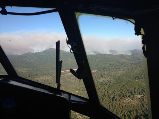 A view of the Rim fire is visible from a MAFFS-equipped U.S. Air Force Reserve C-130 Hercules from the 302nd Airlift Wing, Peterson Air Force Base, Colo., Aug. 26, 2013. Five DOD MAFFS aircraft were activated by the U.S. Forest Service during the month of August to help fight fires in the western U.S. including the massive Rim Fire in California's Sierra Nevada. 