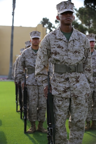 Recruits of Company F, 2nd Recruit Training Battalion stand at attention during their senior drill instructor inspection aboard Marine Corps Recruit Depot San Diego, Aug. 23.  The inspection consists of drill instructors yelling, questioning recruits on basic knowledge and watching to see if they maintain their bearing.