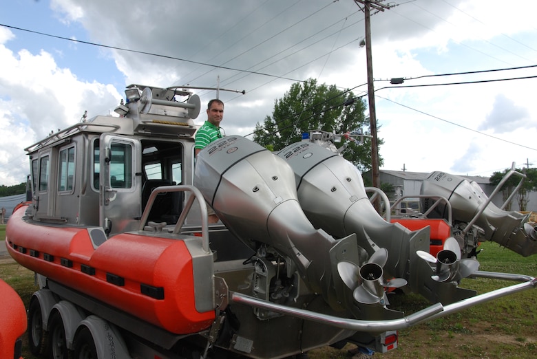ERDC Coastal and Hydraulics Laboratory Researcher William Butler onboard one of seven Defender 250 models recently acquired at the ERDC-Vicksburg site.  Butler was instrumental in acquiring the boats from the U.S. Coast Guard at no cost.