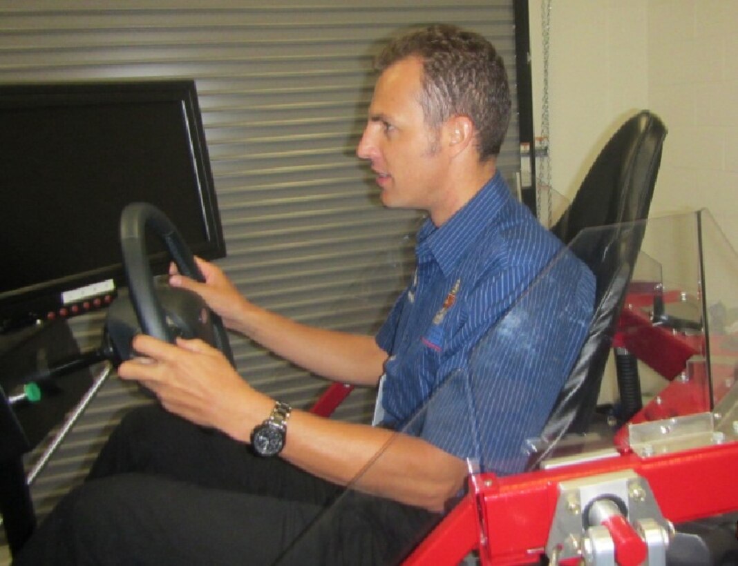Vehicle Mobility Researcher Carl Becker from the Department of Mechanical Engineering of the University of Pretoria in South Africa on the ERDC-CRREL simulator.  