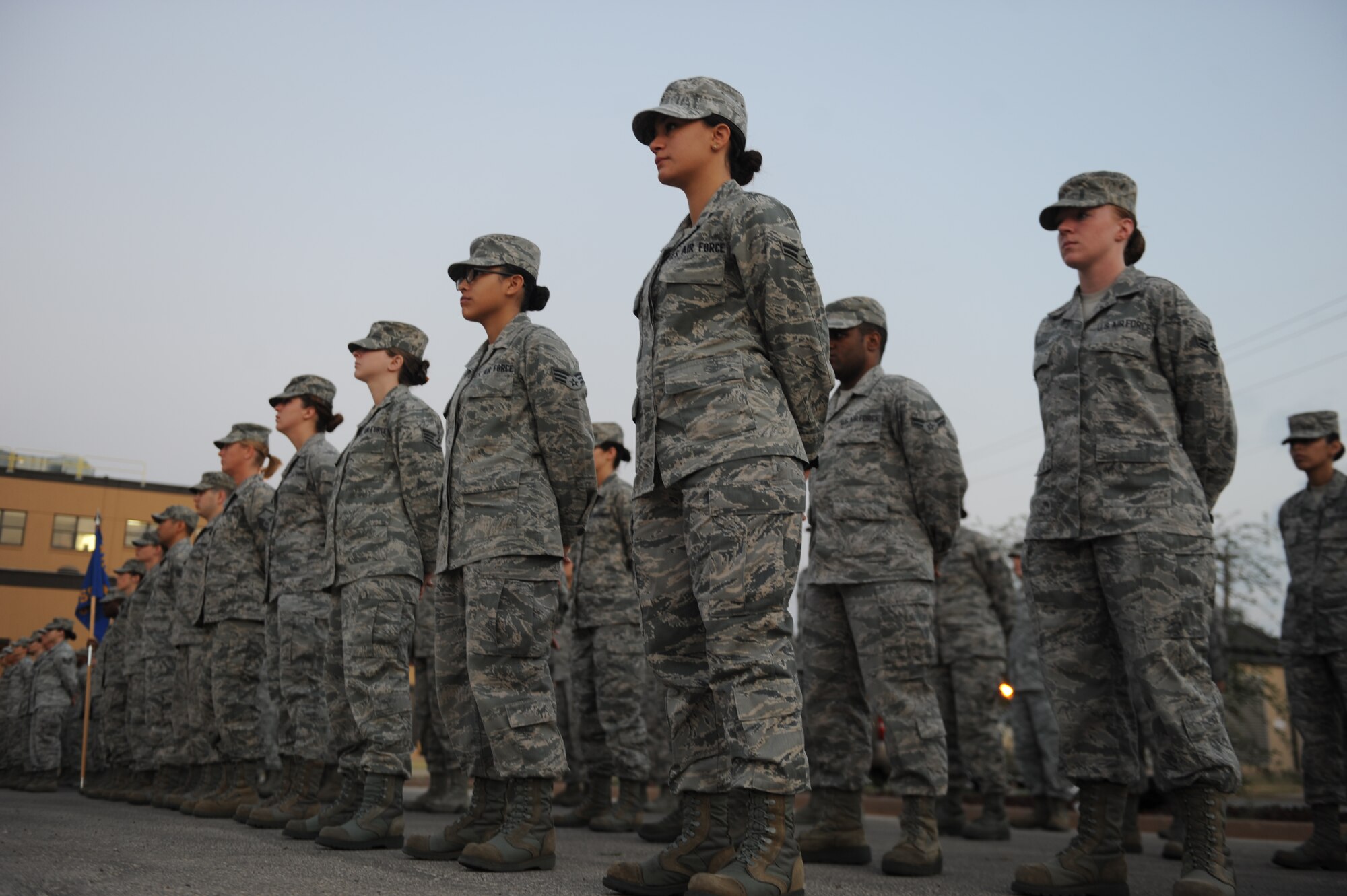 U.S. Air Force Airmen from the 7th Medical Support Squadron, stand at parade rest during an open ranks inspection Sept. 5, 2013, at the medical facility on Dyess Air Force Base, Texas. Open ranks inspections allow commanders to make sure their Airmen are complying with dress and appearance standards. (U.S. Air Force photo by Airman 1st Class Alexander Guerrero/Released)