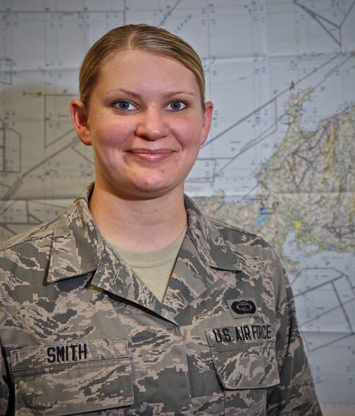 Airman First Class Crys Smith, an intelligence apprentice with the 932nd Operation Support Flight, is the 932nd Airlift Wing's newest member.  Smith graduated technical school Aug. 15th and her first day in her new position with the 932nd was Sept. 9th.  Smith said the 932nd has been very welcoming and she is excited to combine her civilian career with fulfilling a goal to join the Air Force Reserve Command.  (U.S. Air Force photo by Tech Sgt. Christopher Parr)   