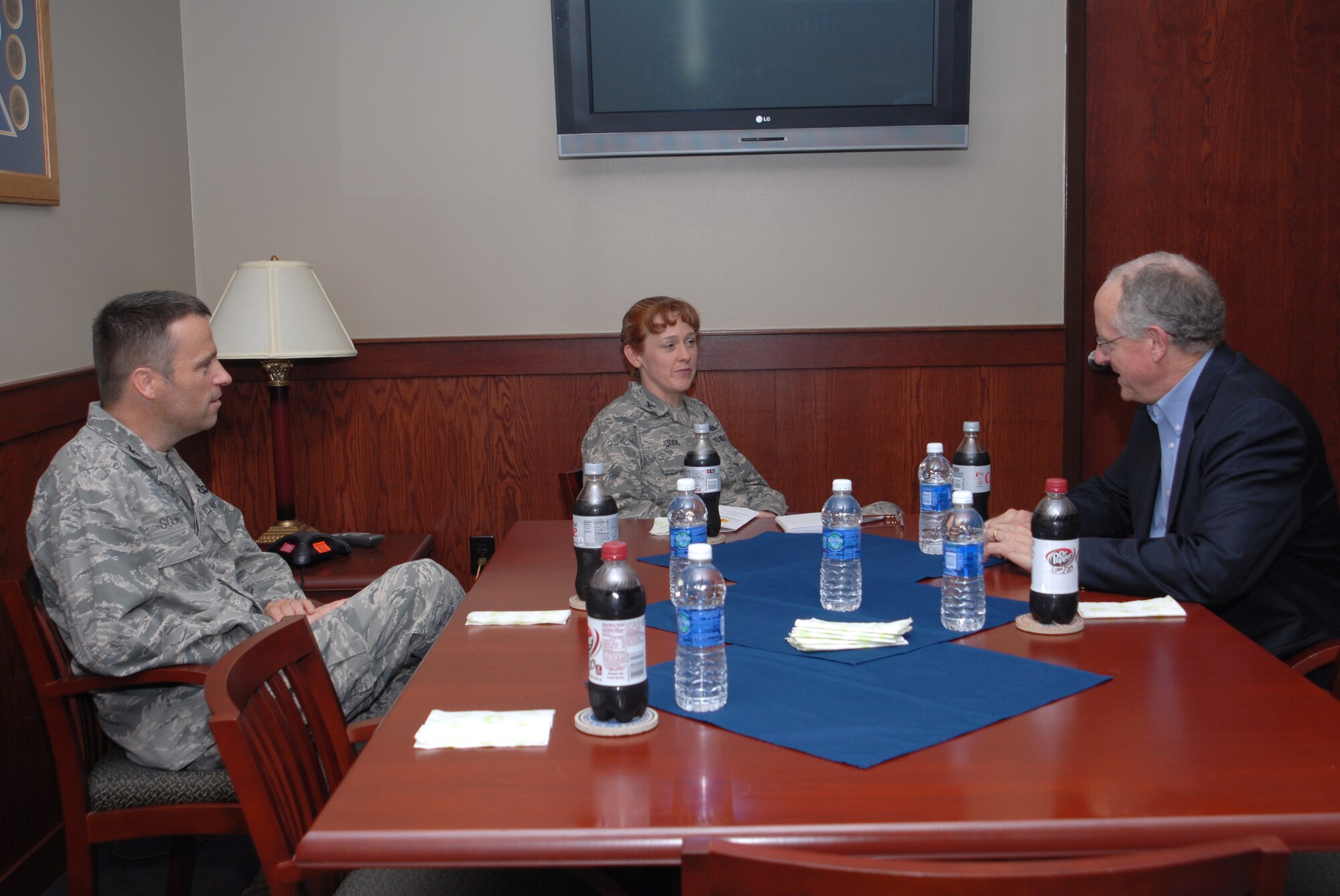 GOODFELLOW AIR FORCE BASE, Texas -- Congressman Mike Conaway, 11th District of Texas, meets with Col. Kimberlee Joos, 17th Training Wing Commander, and Col. Thomas Schmidt, 17th TRW Vice Commander, in Col. Joos’ office Sept. 5. Several topics were discussed including improvements to the base such as the new fire fighter trainer at the Louis F. Garland Department of Defense Fire Academy. (U.S. Air Force photo/ Staff Sgt. Laura R. McFarlane)