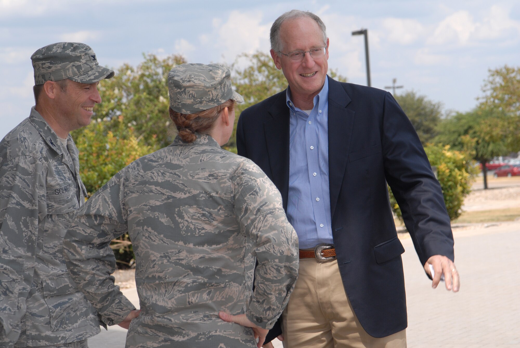 GOODFELLOW AIR FORCE BASE, Texas -- Col. Kimberlee Joos, 17th Training Wing Commander, and Col. Thomas Schmidt, 17th TRW Vice Commander, welcome Congressman Mike Conaway, 11th District of Texas, to Goodfellow at the Norma Brown Building Sept. 5. Conaway visited with senior leadership. (U.S. Air Force photo/ Staff Sgt. Laura R. McFarlane)