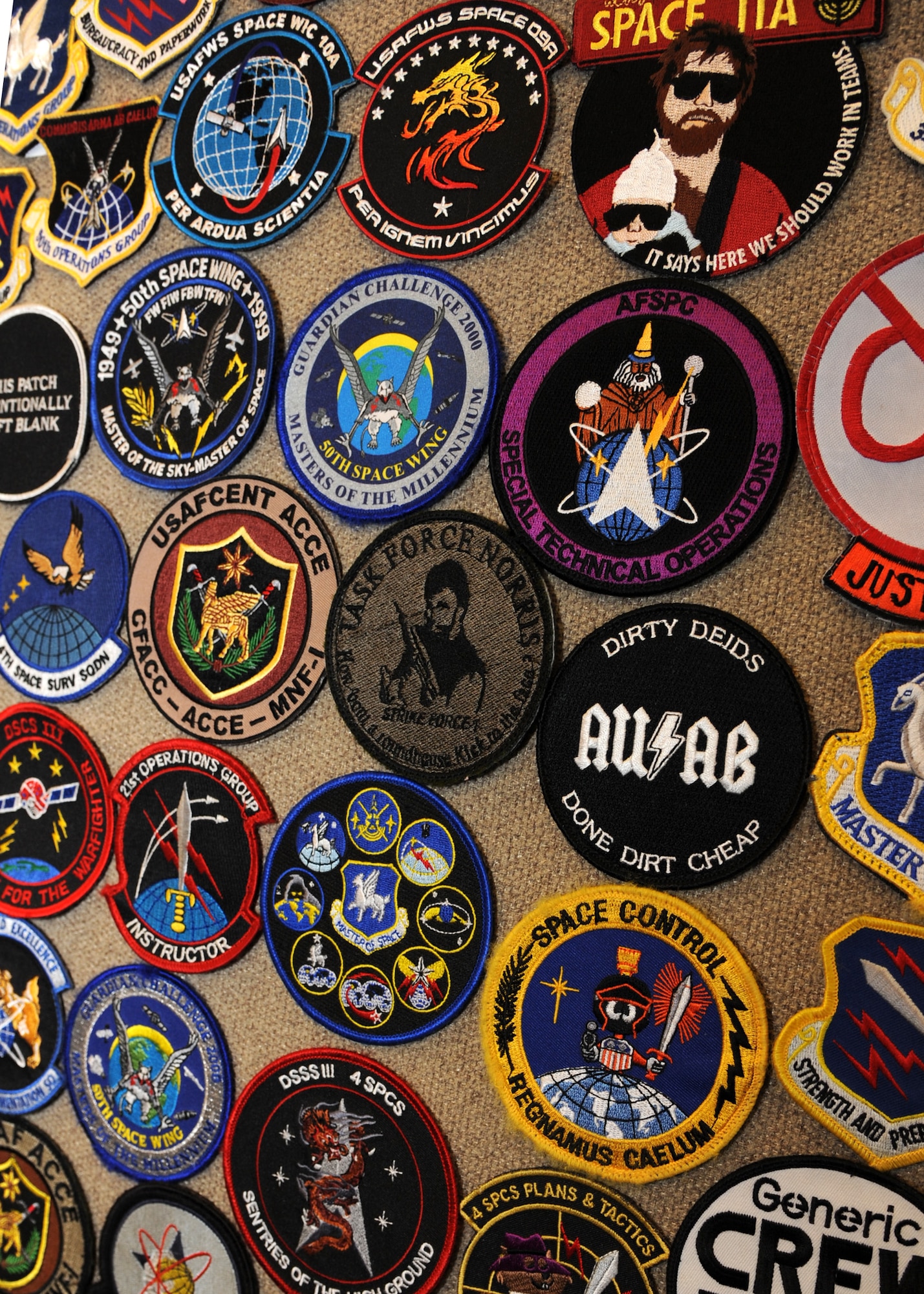 PETERSON AIR FORCE BASE, Colo. – A portion of Lt. Col. Rich Operhall’s collection of more than 15,000 patches are on display in his office here. Operhall began collecting patches in junior high and says his collection fuels his passion of Air Force history and heritage. Operhall said this passion is not as much about the patches as it is the stories and the people who make the Air Force work day-to-day. (U.S. Air Force photo/Staff Sgt. J. Aaron Breeden)