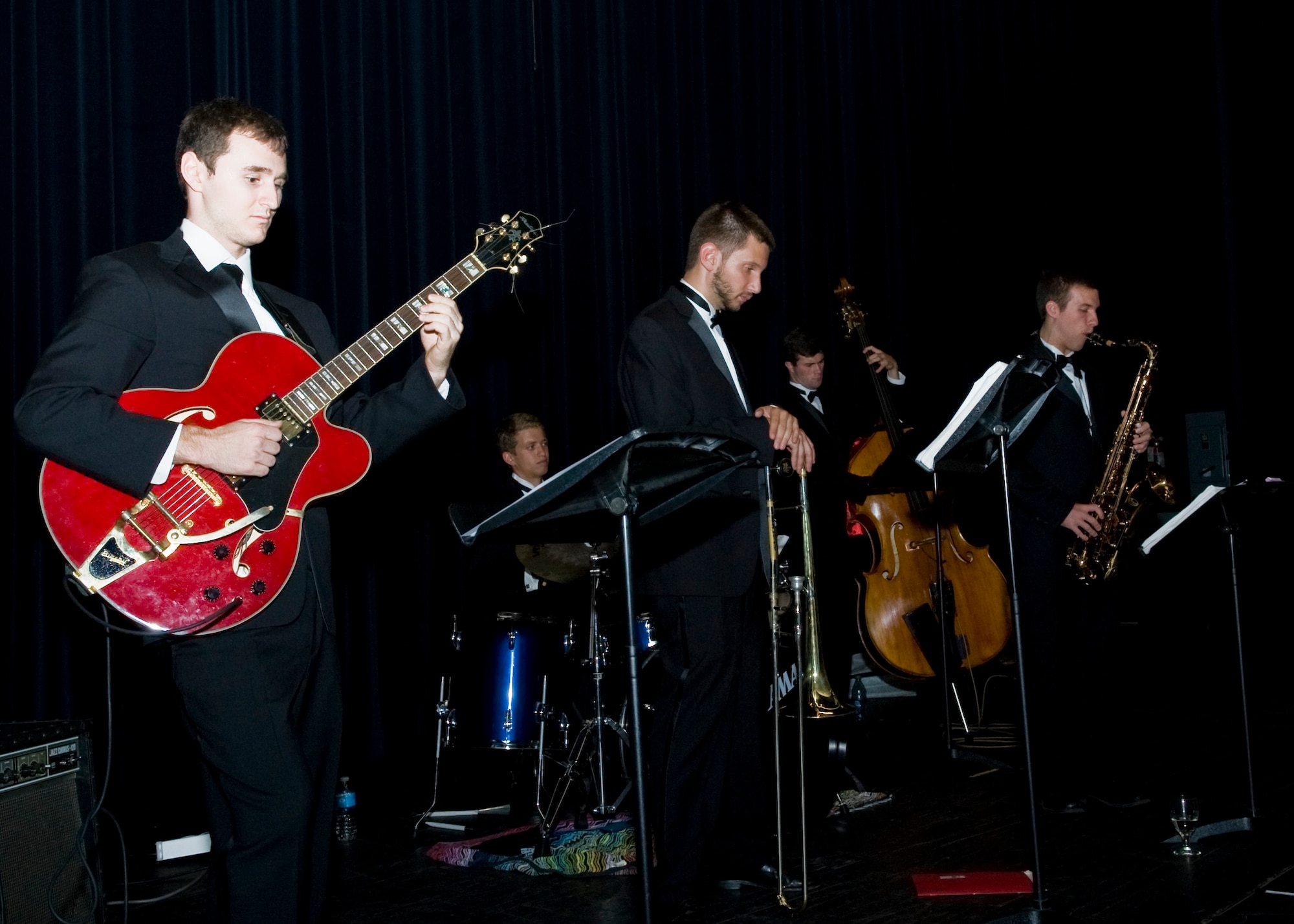 The Groove Society plays casual music prior to the official start of the Air Force Ball Sept. 6, 2013, at Dover Downs in Dover, Del. The 66th Annual Air Force Ball celebrated the separation of the Air Force from the Army into its own branch of service in 1947. (U.S. Air Force photo/ Senior Airman Jared Duhon)
