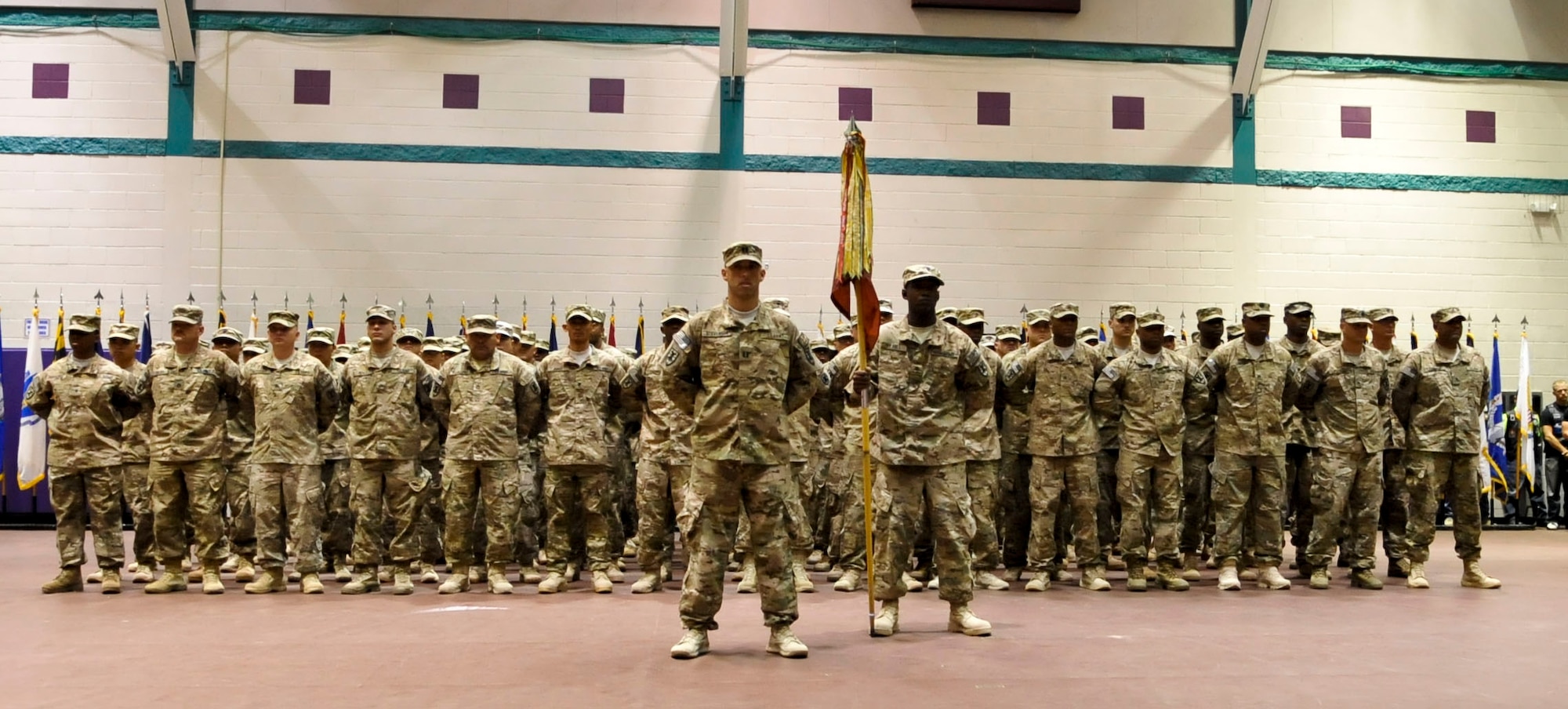 The 359th Inland Cargo Transfer Company stands in formation after arriving at their welcome-home ceremony at Fort Eustis, Va., Sept. 9, 2013. The 359th ICTC completed a nine-month tour in Afghanistan where they conducted 62 missions across 480,000 miles, earned 17 Purple Hearts, 55 combat action badges and two battlefield promotions. (U.S. Air Force photo by Staff Sgt. Wesley Farnsworth/Released)