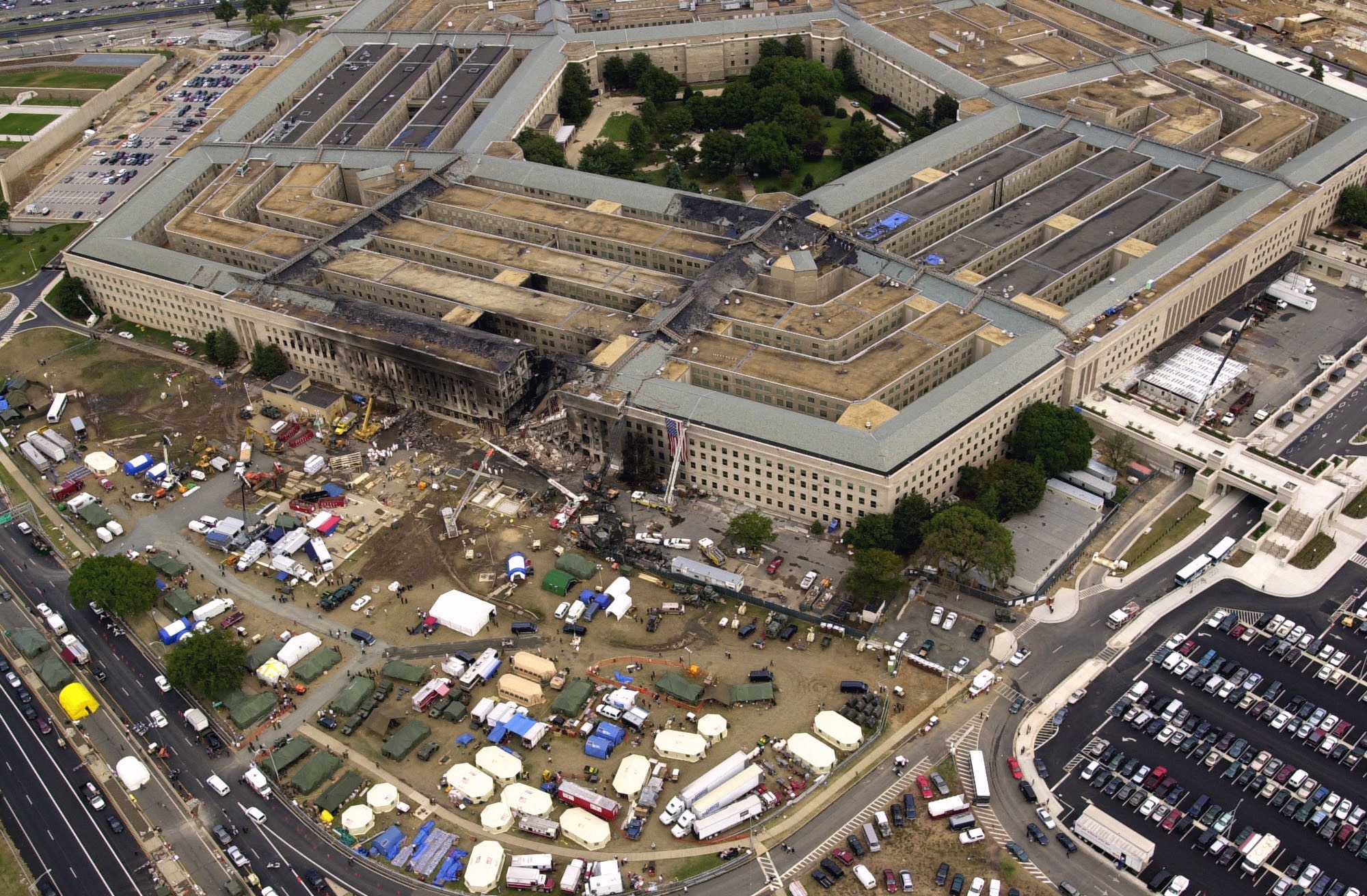 WASHINGTON, D.C. -- An overall aerial view, three days later, of the impact point at the Pentagon where the hijacked American Airlines Flight 77, a Boeing 757-200 entered, breaking up in the process. Cynthia Fleming, a Defense Travel System budget analyst with the Air Force Civil Engineer Center, was working in the Pentagon on Sept. 11, 2001, when the aircraft crashed into the building. (U.S Air Force photo/Tech. Sgt. Cedric Rudisill)