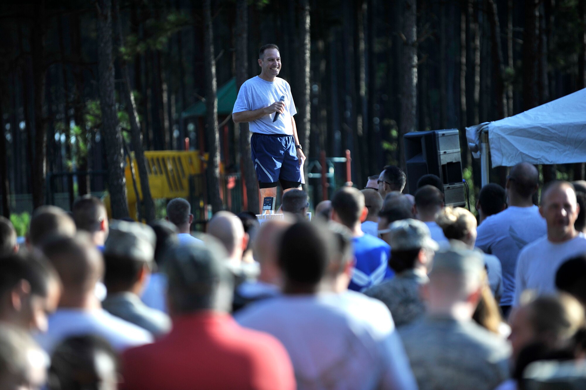 U.S. Air Force Col. Scott Arcuri, 20th Mission Support Group commander, speaks to Airmen and Soldiers participating in the 20thMission Support Group Warrior Challenge, Shaw Air Force Base, S.C., Sept. 6, 2013.  The 20th MSG Warrior Challenge, a day-long event meant to boost morale between Airmen and Soldiers, included softball, tug of war, a watermelon eating contest and other events to build camaraderie.  (U.S. Air Force photo by Airman 1st Class Jensen Stidham/Released)