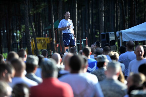 U.S. Air Force Col. Scott Arcuri, 20th Mission Support Group commander, speaks to Airmen and Soldiers participating in the 20thMission Support Group Warrior Challenge, Shaw Air Force Base, S.C., Sept. 6, 2013.  The 20th MSG Warrior Challenge, a day-long event meant to boost morale between Airmen and Soldiers, included softball, tug of war, a watermelon eating contest and other events to build camaraderie.  (U.S. Air Force photo by Airman 1st Class Jensen Stidham/Released)