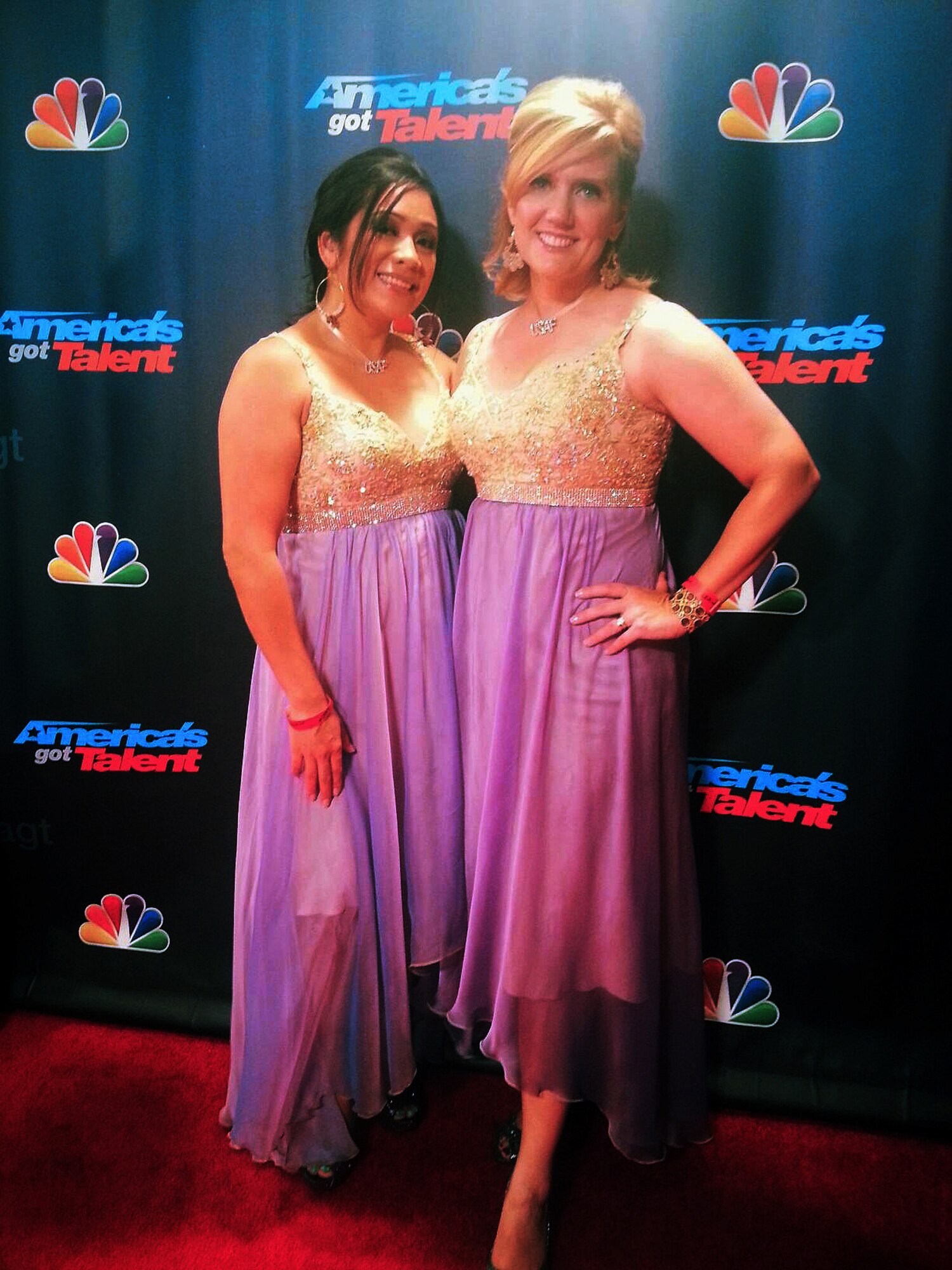 VANDENBERG AIR FORCE BASE, Calif. -- Jennifer Wagner (right) poses for a photo with U.S. Army Sgt. Doreen Fajota prior to a live, semi-final performance on "America's Got Talent" Sept. 3, 2013. The two women were part of the 38-member American Military Spouses Choir that competed on the NBC reality show at Radio City Music Hall in New York City. Wagner's husband, U.S. Air Force Col. John Wagner, is the 614th Air and Space Operations Center commander and Joint Space Operations Center director at Vandenberg Air Force Base, Calif. (Courtesy Photo)