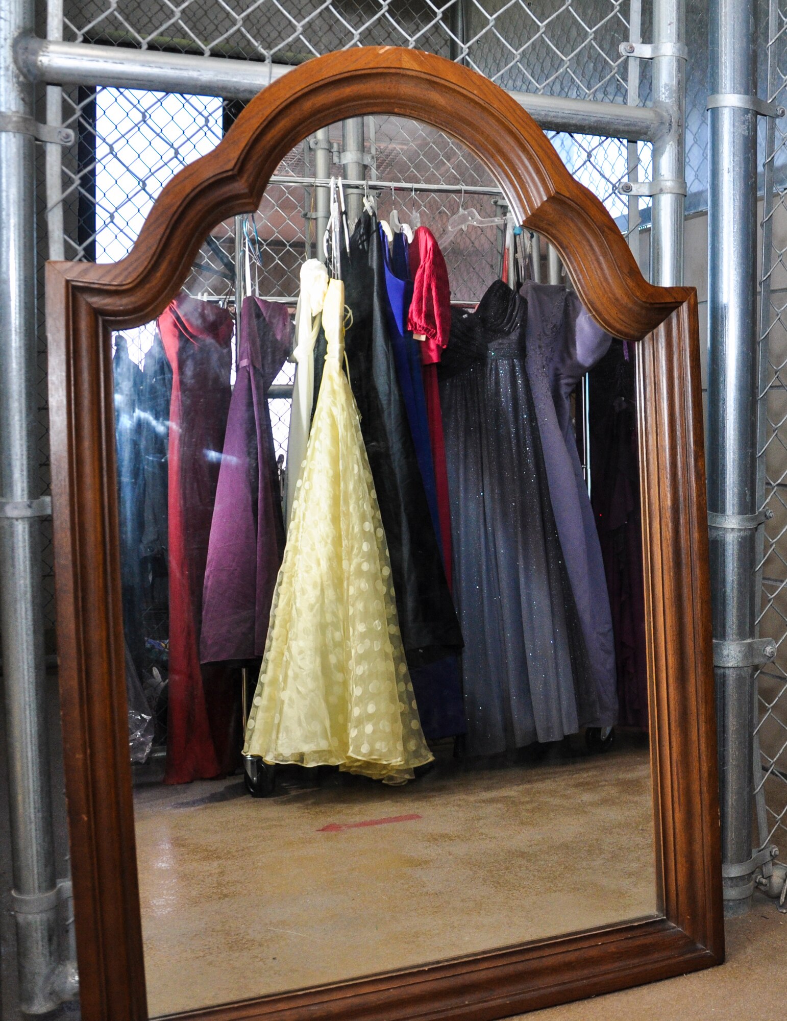 Dresses were donated as part of Cinderella’s Closet, an event hosted by the Buckley Attic to give away free ball gowns to members of every branch of service 1-3:30 p.m. Sept. 10-12, 2013 at Buckley Air Force Base, Colo. The gowns have been cleaned and seamed, all at no cost to the member. (U.S. Air Force photo by Airman 1st Class Darren Scott/Released)  
