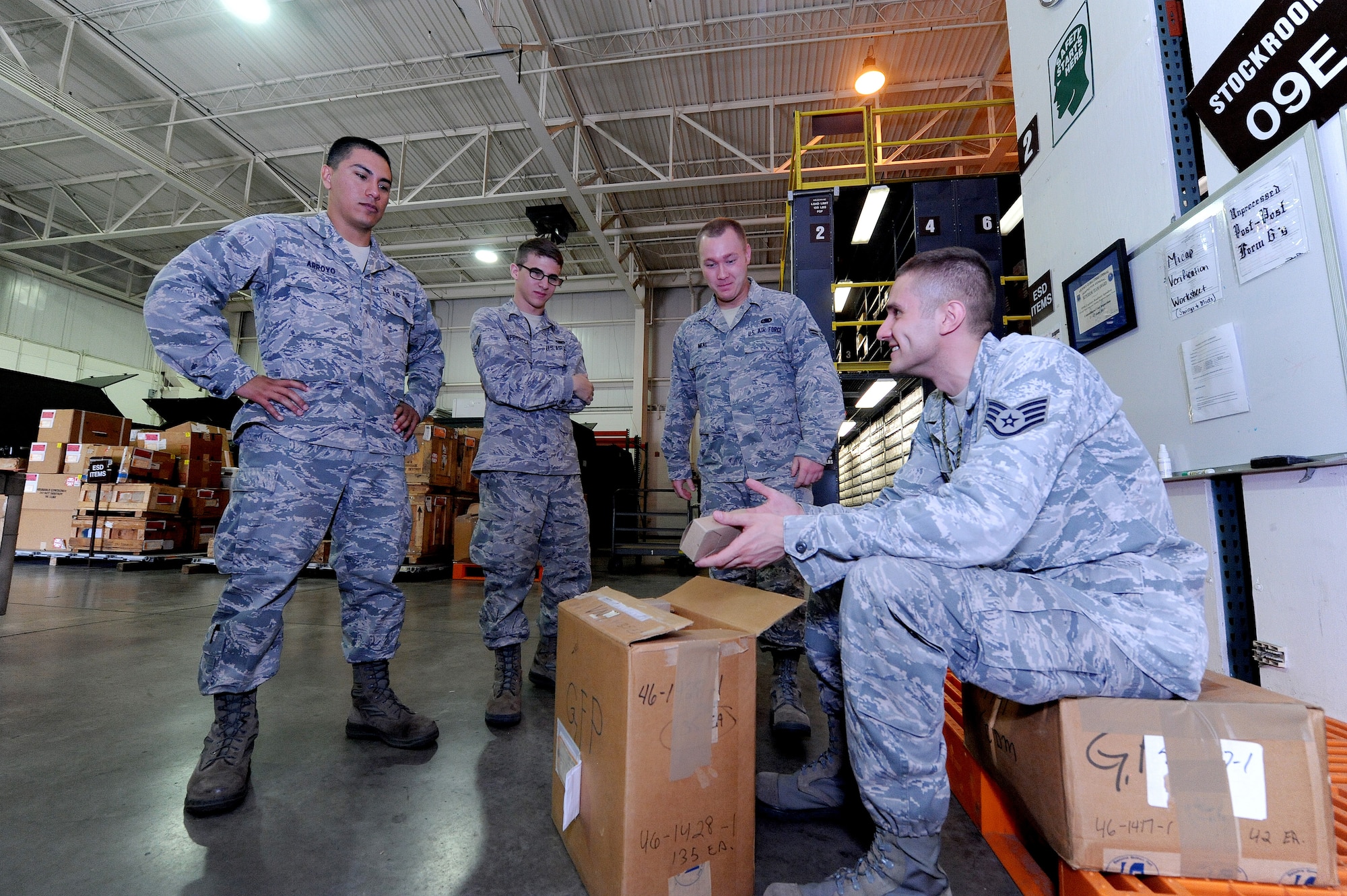 U.S. Air Force Staff Sgt. Anton Auster, 509th Logistics Readiness Squadron aircraft part store supervisor, provides training to Airmen dealing with parts in the “frustrated pallet” of the aircraft part store at Whiteman Air Force Base, Mo., Aug. 2, 2013. The frustrated pallet is used for items in the warehouse that need repair. (U.S. Air Force photo by Staff Sgt. Nick Wilson/Released)
