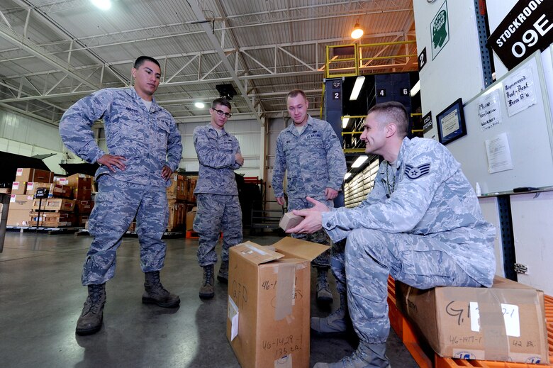 U.S. Air Force Staff Sgt. Anton Auster, 509th Logistics Readiness Squadron aircraft part store supervisor, provides training to Airmen dealing with parts in the “frustrated pallet” of the aircraft part store at Whiteman Air Force Base, Mo., Aug. 2, 2013. The frustrated pallet is used for items in the warehouse that need repair. (U.S. Air Force photo by Staff Sgt. Nick Wilson/Released)
