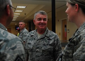 U.S. Air Force Lt. Gen. Thomas Travis, surgeon general of the Air Force, speaks with Airmen at U.S. Air Force Hospital Langley on Langley Air Force Base, Va., Sept. 9, 2013. Travis visited clinics including the Dental Clinic, Family Health and the Intensive Care Unit. Additionally, he hosted an all-call with members of the 633rd Medical Group, where he discussed changes in the medical career field and matters affecting medical personnel. (U.S. Air Force photo by Airman Areca T. Wilson)