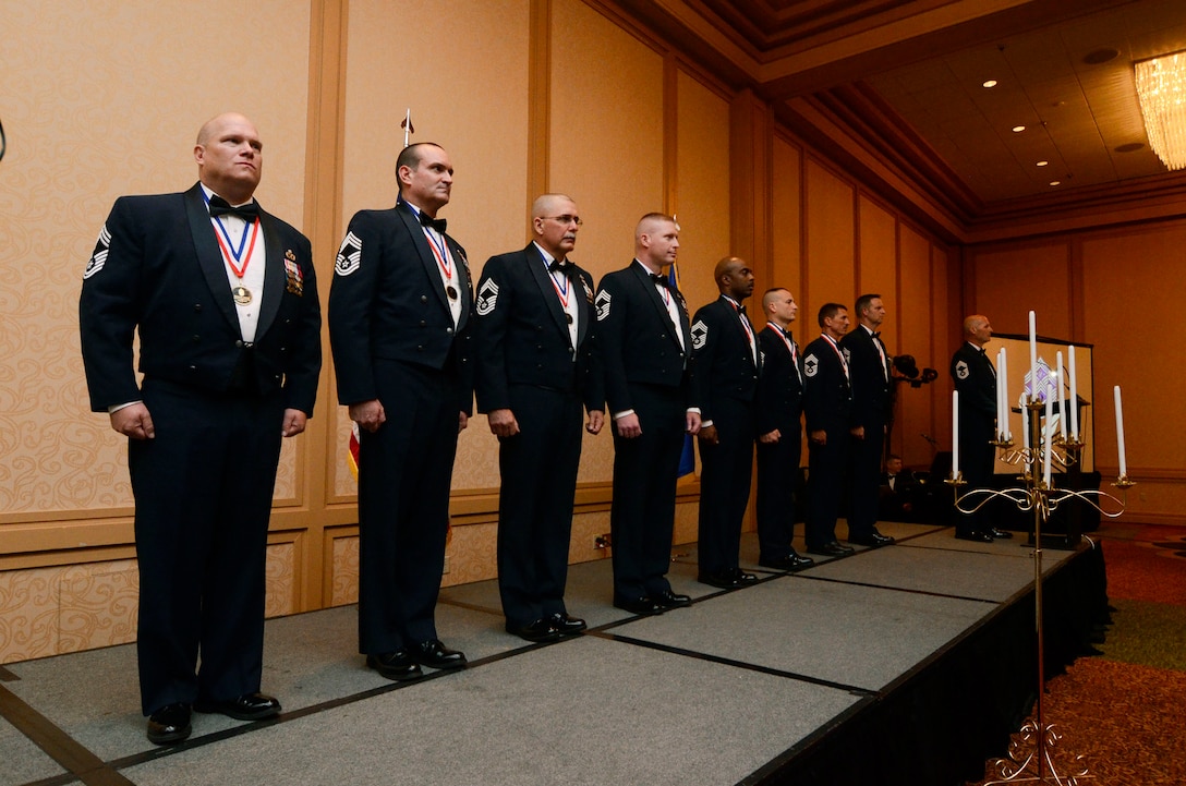 Eight Chief Master Sgt. Inductee’s line-up as they prepare for the official recognition and candle lighting portion of the 2013 Dobbins Chief’s Recognition Ceremony held at Renaissance Waverly Hotel, Atlanta, Ga., Sep. 7. (U.S. Air Force photo/Don Peek)