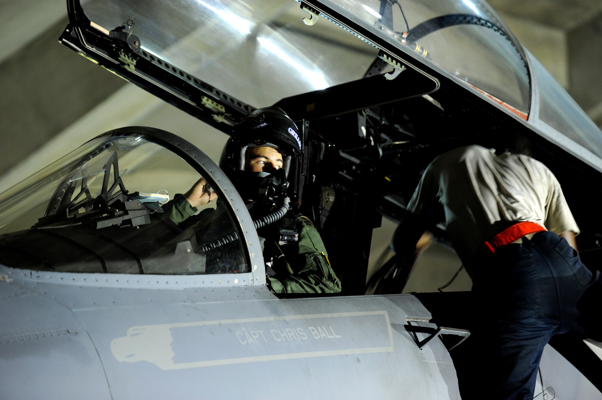 U.S. Air Force Airman 1st Class Corey J. Smith, 18th Aircraft Maintenance Squadron crew chief, and Capt. Jeff Grossman, 67th Fighter Squadron F-15 pilot, perform preflight checks on a U.S. Air Force F-15 Eagle during a local operational readiness exercise on Kadena Air Base, Japan, Sept. 9, 2013. The 18th Wing is home to the Air Force's largest combat wing and is the Pacific hub for delivering quick, lethal airpower in support of contingencies and operations in the region. (U.S. Air Force photo by Senior Airman Maeson L. Elleman)