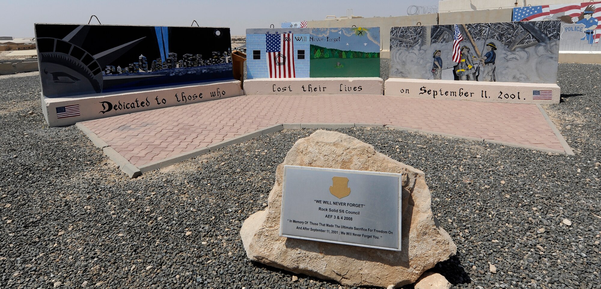The September 11, 2001 memorial at the 386th Air Expeditionary Wing, undisclosed location, Southwest Asia, was initially dedicated in 2008 by the base 5/6 council.  Thirteen volunteers recently completed restoration of the memorial in time to mark September 11, 2013.  (U.S. Air Force photo by Master Sgt. Christopher A. Campbell)
