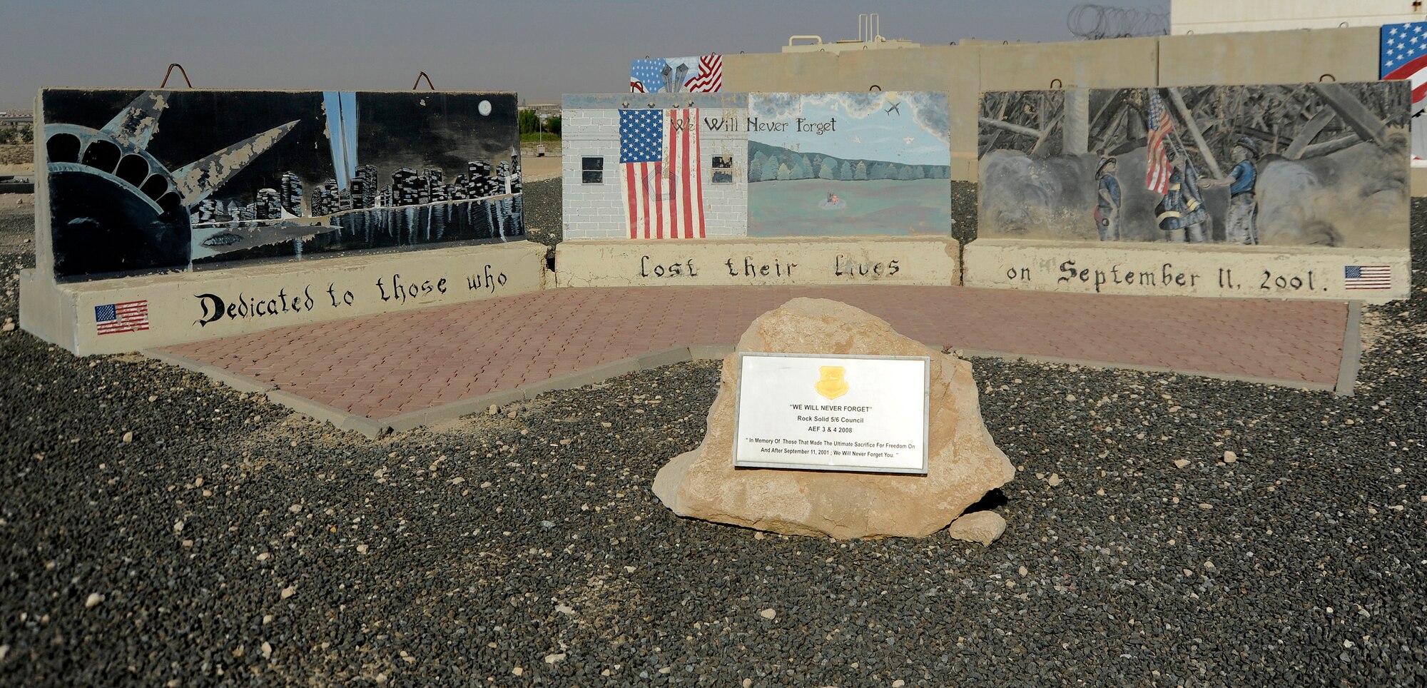 The September 11, 2001 memorial at the 386th Air Expeditionary Wing, undisclosed location, Southwest Asia, show effects of the harsh environment.  The memorial that was initially dedicated in 2008 by the base 5/6 council was repainted and restored by base volunteers in time to mark September 11, 2013. (U.S. Air Force photo by Master Sgt. Christopher A. Campbell)