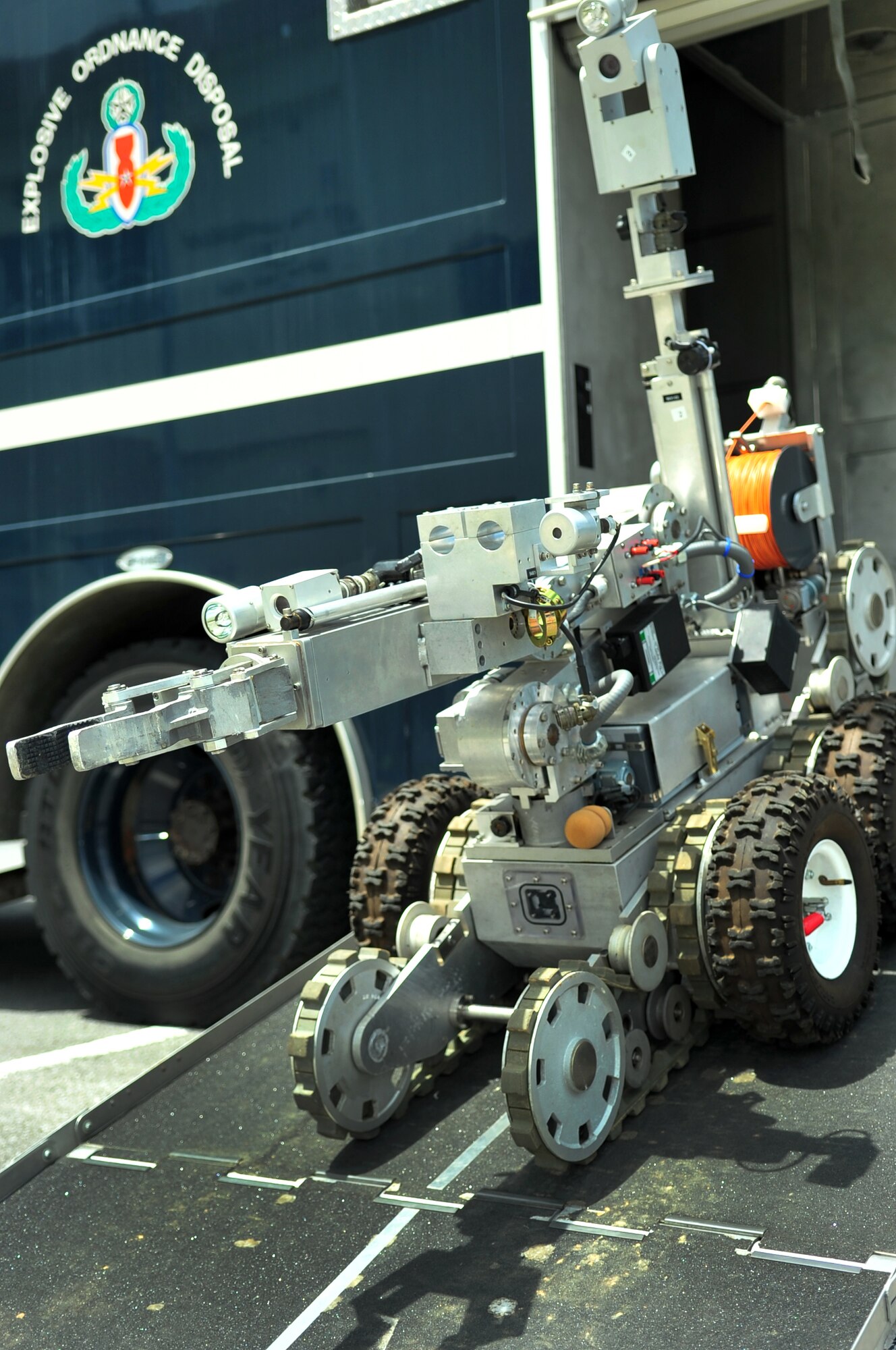 A U.S. Air Force 18th Civil Engineer Squadron Explosive Ordnance Disposal technician operates an F-6 explosive ordnance disposal robot in response to a suspicious bag during a local operational readiness exercise on Kadena Air Base, Japan, Sept. 10, 2013. The 18th CES Explosive Ordnance Disposal Flight is the only U.S. Air Force EOD flight on Okinawa and responds to more than 50 disposal operations a year. (U.S. Air Force photo by Staff Sgt. Amber E. N. Jacobs)