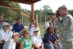 Employers visiting Camp Atterbury, Ind., in 2009 are instructed in the operation of an M4 carbine.
