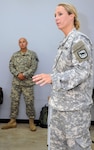 South Dakota Army National Guard Staff Sgt. Kaye Nicolaisen, right, and Staff Sgt. Wade Vanderberg, both trainers with 2nd Battalion, 196th Regiment, take part in a 'Train the Trainer' exchange with members of Suriname's armed forces on Aug. 27, 2012, in Paramaribo, Suriname.