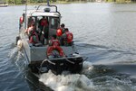 New York Naval Militia Patrol Boat 230 gets underway with a New York Guard (state defense force) Search and Rescue Team on the Hudson River at Troy, N.Y., Sept. 14, 2012.