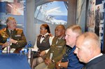 Maj. Gen. Roy Andersen, Chief of the South African National Defence Reserve Forces, Brig. General Debbie Molefe, Director Defence Reserves, Chaplain Gen. Andrew Jamangile, Major Gen. Verle Johnston, the commander of the New York Air National Guard and Col. Ray Shields, the Director of Joint Staff for the New York National Guard, meet to discuss state partnership program initiatives.