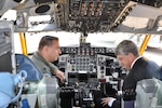 U.S. Ambassador to South Africa Donald H. Gips sits in a KC135T Stratotanker cockpit with Michigan Air National Guard aircraft commander Lt. Col. Paul Beck, Sept. 19, 2012. The two discussed the aircraft’s mission and capabilities during the opening day of the 2012 Africa Aerospace and Defense Airshow and Exhibition.