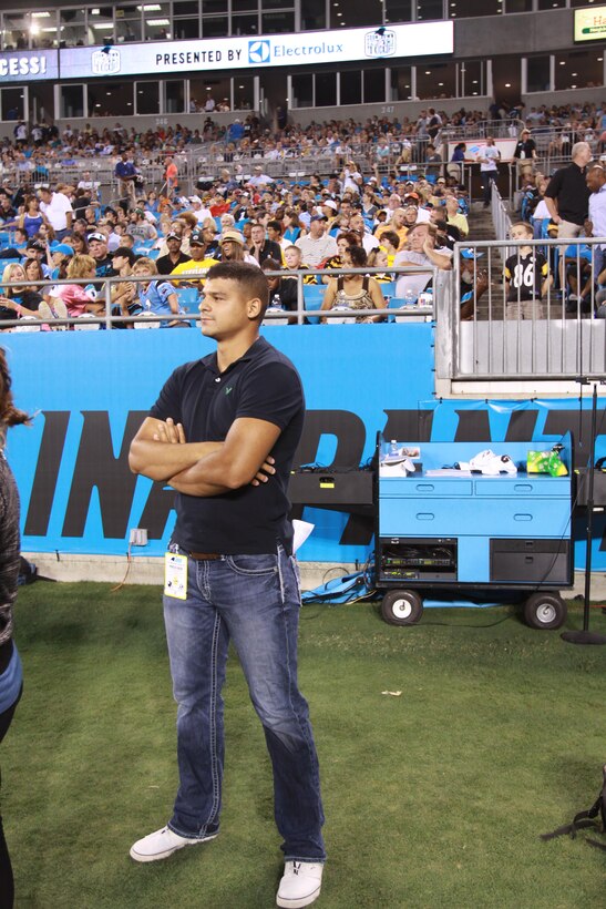 Marines with Marine Corps Air Station New River's Single Marine Program watch a football game between the Carolina Panthers and the Pittsburgh Steelers, Aug. 29, at the Bank of America Stadium in Charlotte, N.C.